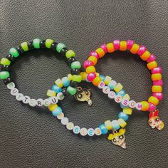 Bracelets inspired by the characters from Encanto Bracelets Kandi, Kandi Bracelets, Star Character, Powerpuff Girls, Jewelry Bracelets, Handmade Items, Bathing Beauties, Beaded Bracelets, Electronic Accessories