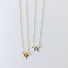 A lovely little shooting star (measuring about 12mm) is hung from a gold fill or sterling silver chain. The star pieces are made from either sterling silver or sterling silver plated in 22k gold.Each Luminous Collection necklace will come packaged and ready to give as a gift.View other pieces inspired by the sky in our Luminous Collection:https://www.etsy.com/shop/AcuteDesigns?ref=seller-platform-mcnav&section_id=23458094***********************************************************Item will be shi Dainty Adjustable Star Charm Necklaces, Tiny Star-shaped 14k Gold Jewelry, Dainty Star Charm Necklaces, Dainty Star-shaped Personalized Necklace, Everyday Celestial Star Necklace, Gold Jewelry With Star Print For Gift, Dainty Personalized Star Necklace, Delicate Star-shaped Jewelry For Everyday, Delicate Everyday Star-shaped Jewelry