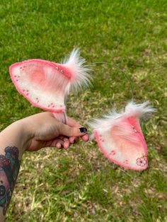 Sakura Themed Pink and White faux fur deer / fawn ears with pink speckles! Ears Include rhinestones and gold hoop with cherry blossom charm.  (Stay tuned for more deer / fawn ear themes) My shop's ears and tails are completely hand crafted and might have some slight differences in trimming and airbrushing. PLEASE NOTE: CUSTOMIZATIONS TO ORDERS MUST BE MADE PRIOR TO PURCHASING! WE ARE NOT RESPONSIBLE FOR ANY CUSTOMIZATIONS AFTER PURCHASE IS MADE.  ALL CUSTOM ORDERS ARE FINAL WITH NO RETURNS. Than Pink Deer, Cosplay Animal Ears Diy, Animal Ears Cosplay, Adjustable Fantasy Cat Ears Costume Accessories, Pink Cat Ears, Deer Tail, Deer Ears, Cow Ears, Diy Kandi Bracelets