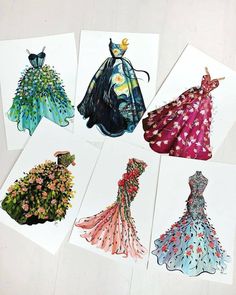 six different colored dresses on white cards with flowers in the middle and one wearing a hat