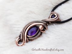 "Wire Wrapped Amethyst Pendant, Empath Protection Amethyst Necklace, Elven Jewelry, Protection Amulet Necklace, Healing Amethyst Gift for Her Unique Handmade Artisan Jewelry !! Original Designs by ArtsvilleHandcrafted If you love unique designs and Amethyst then...this beauty is perfect for you!! This piece has a gorgeous Amethyst, garnet and is created with Pure Copper Wires. IMPORTANT Select your choice of length for the necklace. All Jewelry is Gift Wrapped!! And dispatched within 1-2 working Amethyst Wire Wrapped Necklace Gift, Purple Amethyst Wire Wrapped Necklaces, Unique Amethyst Wire Wrapped Necklaces, Bohemian Wire Wrapped Amethyst Necklace, Handmade Amethyst Amulet Crystal Necklace, Purple Amethyst Amulet Jewelry, Empath Protection, Wire Jewerly, Elven Jewelry