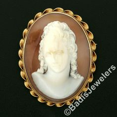 "This unique vintage brooch or pendant was crafted from solid 14k yellow gold. It features a large oval shaped carved shell cameo bezel set at its center. The piece of shell used for this particular carving is very uniquely convex shaped allowing the portrait to have a domed 3D look. That cameo is then surrounded by a pair of twisted wire frames with a finer one on the inside and a much coarser one on the outside.This unique vintage piece remains in excellent and 100% ready to wear upon arrival. Antique Oval Carved Brooches, Gold Oval Carved Brooches, Oval Carved Gold Brooches, 3d Portrait, Carved Shell, Twisted Wire, Wire Frame, Green Enamel, Vintage Brooch