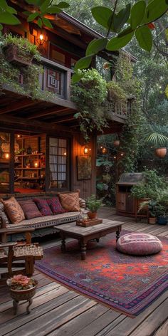 a wooden deck with lots of furniture and plants