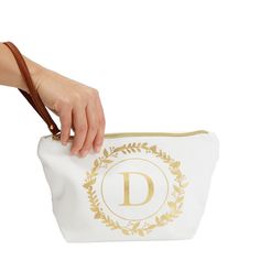 Easily store and transport your makeup and cosmetic items with our elegant initial letter D personalized bag. The bag is made of reliable canvas material with a PU leather handle, helping ensure your cosmetic items stay safe. You can give this bag to a loved one, friend, or family member who has an initial D in their name to make a great personalized birthday gift. White Monogram Bag For Everyday Use, White Canvas Bag With Removable Pouch As A Gift, Elegant Rectangular Monogram Canvas Pouch, Personalized Cosmetic Pouch Bag, Personalized Pouch Cosmetic Bag, Personalized White Zipper Pouch Cosmetic Bag, Personalized Pouch Cosmetic Bag For Daily Use, Initial Makeup Bag, Cheap Personalized Rectangular Cosmetic Bag