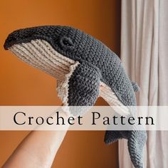 a crocheted stuffed animal is being held up by someone's hand with the words crochet pattern on it