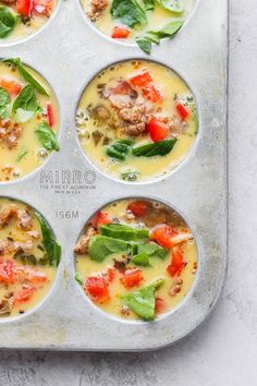 six muffin tins filled with different types of food