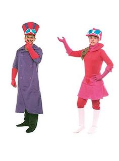 two people dressed in costumes standing next to each other