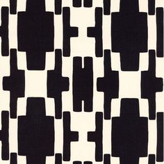 an abstract black and white pattern on fabric