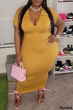 Olivia Mark - Stylish Solid Yellow Short Sleeve V-Neck Dress Seamlessly Catering to Plus Size Womens Fashion Needs.