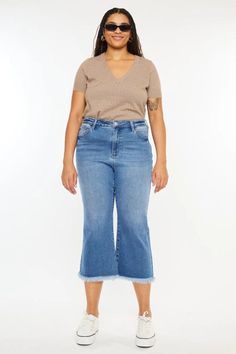 Almira High Rise Capris ( Plus Size) by Kancan | The Ultimate Denim Shop | Premium denim meets comfort | Designed in Los Angeles. Our Almira Capris Flare is our latest addition to our collection that will add more variety to your wardrobe. It comes in a medium wash and sits slightly above the natural waistline and above the hips. Fits snug from hip to thigh and lays right above the mid-calf. Shop now! plus size denim, comfortable wear, stylish curves, everyday chic, versatile capris Flattering Jeans, Plus Size Denim, Everyday Chic, Curvy Plus Size, Lifestyle Inspiration, Perfect Wardrobe, Denim Outfit