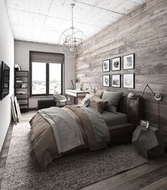 a bedroom with wood paneling and pictures on the wall, along with a bed