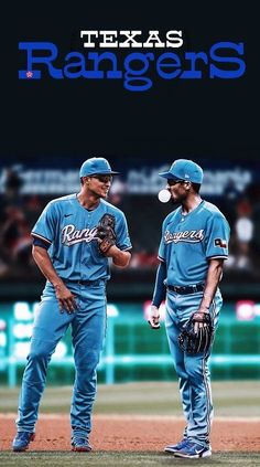 two baseball players standing next to each other on a field with the words texas rangers