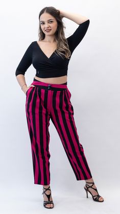 Women's tango pants are specifically designed for the dance style of Argentine tango. These pants are tailored to provide both comfort and elegance while allowing freedom of movement during intricate dance steps.  Fit: Tango pants are usually tailored to fit snugly around the hips and thighs, with a slight flare or wider leg opening below the knee. This design allows for ease of movement and also accentuates the leg lines during dance movements. Material: Pants are made of %90 polyester, and %10 lycra to provide flexibility and comfort. Colors and Designs: While black is a popular color for tango pants due to its versatility and ability to match with different tops, they also come in a range of colors and patterns,( like stripes, dots and flowers )allowing dancers to express their individu Tango Pants, Dance Style, Tango Dance, Argentine Tango, Dance Movement, Womens Trousers, Dance Steps, Black Lines, Dance Fashion