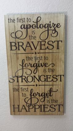 a wooden sign that says the first to apologe is the braves, the first to