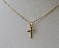 Real Gold Cross Necklace This delicate, classic, simple cross charm pendant is made of 14K solid gold.  Simply beautiful! Cross Size: 15mm (about 5/8 inch) Catholic Cross Necklace, Cross Jewelry Necklace, Latest Jewellery Trends, Gold Chains For Men, Gold Cross Necklace, Gold Cross Pendant, Gold Chain Jewelry, Jewelry Lookbook, Original Jewelry