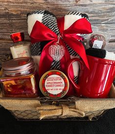 a gift basket filled with coffee, jam and other holiday items for someone special occasion