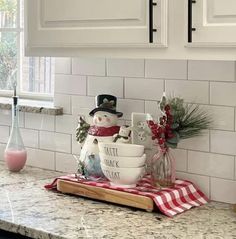 Kitchen Christmas Centerpiece, Christmas Centerpiece For Kitchen Island, Kitchen Counter Decor Christmas, Christmas Snowman Decor Ideas, Christmas Kitchen Vignettes, Christmas Decor For Kitchen Counter, Kitchen Sink Christmas Decor, Cookie Jars Ideas, Christmas Kitchen Counter Decor