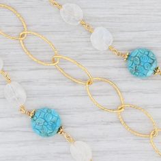 "This lovely new necklace is an authentic Nina Nguyen piece. This necklace has a retail price of $395. Gem: Natural Turquoise, Druzy Quartz Metal: Sterling Silver, 22k Gold Vermeil Weight: 35.5 Grams Stamps: Nina N 925 Style: Cable Chain, Linked Turquoise Closure: Lobster Clasp Chain Length: 45\" Adjustable Width: 12.2 - 11.1 mm Each piece is thoroughly examined and refinished as needed by our professional jewelers, graded by our in-house GIA (Gemological Institute of America) Graduate Gemologis Artisan Turquoise Jewelry With Beaded Chain, Elegant Turquoise Necklace With Lobster Clasp, Artisan Turquoise Beaded Chain Necklace, Turquoise Beaded Chain Long Necklace, Turquoise Long Necklace With Beaded Chain, Druzy Quartz, Greensboro Nc, Natural Turquoise, 22k Gold