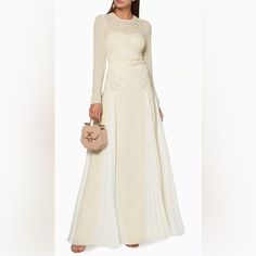 Belted, Long Sleeve, Embroidered Dress With Pleating. Beautiful White And Off White Detailing. Elegant Silk Maxi Dress With Floral Embroidery, Elegant Floral Embroidered Evening Gown, Elegant Embroidered Banquet Gown, Elegant Embroidered Gown For Banquet, Chic Embroidered Formal Dresses, Chic Embroidered Dress For Formal Occasions, Elegant Floral Embroidered Maxi Dress For Wedding, White Luxury Cocktail Evening Dress, Luxury White Cocktail Evening Dress