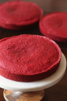 red velvet cake sitting on top of a white plate