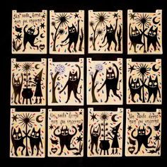 six coasters decorated with cats and fireworks on black background, set of eight pieces