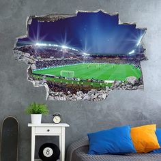 a soccer stadium wall sticker in the corner of a bedroom