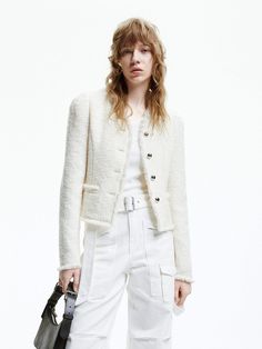 MO&Co. Women's Cropped Raw Trimmed Jacket Crafted from a luxurious blend of wool, its rough textured pattern and delicate frayed edges exude sophistication. This cream-colored little Chanel-inspired piece pairs perfectly with matching or white high-waisted trousers. Features : - Regular fit- Tweed texture, sophisticated raw trims- Silver metal button closure, collarless design Code: MBD1COTT11The back length of size S is 50.3cmMATERIALS & CARE Material: 66.2% Wool 16.7% Polyester 14.8% Acrylic 2 White Wool Tweed Jacket In Chic Style, Chic White Wool Tweed Jacket, White Wool Tweed Jacket With Long Sleeves, Tweed Texture, Chanel Jacket, Chanel Inspired, White Tweed, High Waisted Trousers, Tweed Jacket