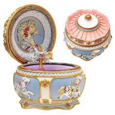 an elaborately decorated trinket box with a carousel scene painted on the lid