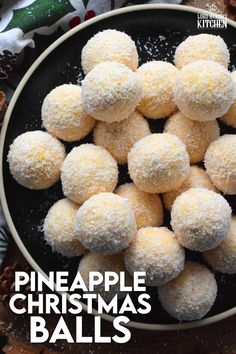 pineapple christmas balls in a black bowl with white sugar on top and the words pineapple christmas balls above it