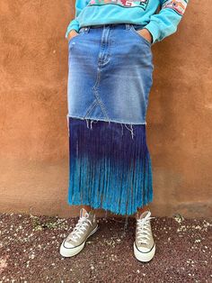 Discover a treasure from the past with this preloved and preworn vintage item. Each piece carries a unique story. Embrace its history and make it a part of your own journey.This rodeo ready Wrangler skirt has hand dyed fringe colored to the big blue skies of New Mexico. Vintage denim, zipper fly, button front. One of a kind. Waist 34”Hips 42”Length 17”Fringe 14”If you're seeking a flawlessly "new" item, these may not be for you. However, if you desire a vintage piece with a soulful charm, then y Dyed Fringe, Rhapsody In Blue, The Big Blue, Curated Vintage, Blue Skies, Big Blue, Upcycled Vintage, Vintage Gifts, Vintage Denim