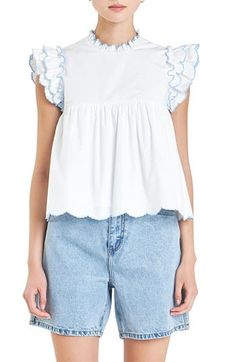 Scalloped ruffles with embroidered edges sweeten a flouncy cotton top framed by triple-layer cap sleeves. Back keyhole with button-and-loop closure Ruffled jewel neck Cap sleeves Lined 100% cotton Hand wash, dry flat Imported Cotton Top With Ruffle Hem And Ruffled Collar, Cotton Tops With Ruffle Hem And Ruffled Collar, Feminine Cotton Tops With Scalloped Edges, White Tops With Scalloped Edges For Spring, Spring Cotton Top With Scalloped Edges, Cotton Tops With Scalloped Edges For Spring, Cotton Tops With Ruffle Hem, White Short Sleeve Tops With Scalloped Edges, White Tops With Scalloped Edges And Short Sleeves