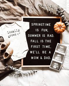 a baby's outfit and shoes are laid out on a bed with the words springtime is fun, summer is rad, fall is the first time, well be a mom & dad