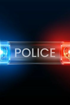 the word police is glowing in front of a black background with red and blue lights