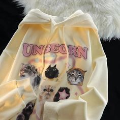 Dive into the Playful World of Kawaii with Our Cat Hoodie!  Specifications: Product Type: Hoodie Material: 100% Polyester Available Colors: Black and Apricot Design: Compilation of 5 kawaii cats in various humorous and cute poses with scattered star prints. Ideal For: Ladies and best friends pairs. <... Long Sleeve Cotton Hoodie With Cat Print, Kawaii Long Sleeve Hoodie With Cat Design, Cute Cat Print Hooded Hoodie, Cute Long Sleeve Sweatshirt With Cat Print, Cute Long Sleeve Sweatshirt With Cat Design, Cute Long Sleeve Hoodie With Cat Design, Cute Winter Hoodie With Cat Print, Cute Winter Cat Print Hoodie, Kawaii Sweatshirt