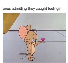 a cartoon mouse holding a pink heart with the caption aris admiting they caught feelings