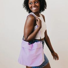 Meet your new BFF - the Carrie Catch All Shoulder Tote Bag! This trendy athleisure bag is perfect for gym days, running errands, or just looking stylish on the go. Comes in multiple colors including black, white, fuchsia, and lilac. Includes a removable strap, inner zipper pocket, and middle divider that also has a zipper pocket for all your essentials. Plus, a latch closure for extra security. The Carrie Catch All Shoulder Tote Bag is another addition to our 3 Sisters Collection! This collectio Casual Sports Shoulder Bag With Adjustable Strap, Casual Everyday Bags With Water Bottle Pocket, Casual Travel Shoulder Bag With Water Bottle Pocket, Trendy Shoulder Gym Bag With Adjustable Strap, Adjustable Strap Nylon Gym Bag, Trendy Gym Bag With Adjustable Strap, Trendy Sports Shoulder Bag With Adjustable Strap, Sporty Shoulder Bag With Adjustable Strap, Trendy Shoulder Gym Bag For Travel