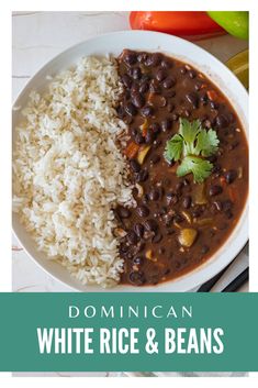 white rice and beans are served in a bowl with cilantro on the side