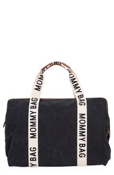 a black and white duffel bag with words on the side that says, no one is