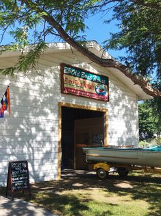 a boat is parked in front of a building