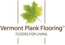 the vermont plank flooring logo with a maple leaf on it's bottom corner