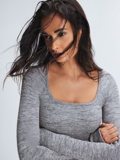 Seamless Sport Long-Sleeve Cropped Bra Top in Grey & Silver | SAVAGE X FENTY Doe Eyes, Crop Bra, Savage X Fenty, Crop Top Bra, Black Caviar, Bra Top, Metallic Logo, Ribbed Fabric, High Waisted Pants