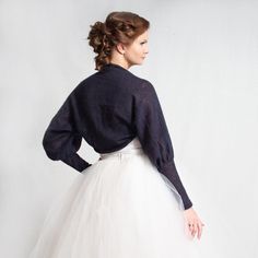 This handmade bolero has dark blue color. Bolero is made of soft mohair yarn. This bolero has puff sleeves. It will look good with any type of clothing, it will be amazing with any type of bridal and bridesmaids dress and will keep your shoulders warm. Made from high quality Italian yarn. Measurements: for size XXS Underarm 38 cm = 15 in Sleeve width at top (lying flat-unstretched): 38 cm = 15 in Sleeve length on inside seam: 47 cm = 18.5 in Sleeve width under elbow 18 cm = 7.1 in (unstretched) Elegant Fitted Formal Sweater, Elegant Fitted Cardigan With Puff Sleeves, Formal Long Sleeve Shrug For Fall, Elegant Wedding Sweater For Winter, Elegant Winter Wedding Sweater, Elegant Fitted Cardigan For Weddings, Elegant Long Sleeve Fall Shrug, Fall Wedding Long Sleeve Shrug, Elegant Evening Sweater For Winter