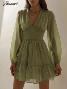 Description:Tailored from semi-sheer chiffon, this light and pretty dress nicely defines the waistline before falling to a generously flared mini hem beautifully gathered and traced with ruffles. The dress has a delicate bodice with a plunging V-neckline tempered by airy puffy sleeves elasticated at the cuffs.Features:✔ mini-length hem✔ slightly close fit✔ V-neckline✔ elasticated puffed sleeves✔ flared, ruffled hem✔ concealed zip fastening along the sideDetails:Model parameters: height 173 cm, c Women French Style, Mint Green Prom Dress, Evening Dress Beaded, Orange Pink Color, French Women Style, Party Mini Dress, Green Prom Dress, Black Evening Dresses, Mermaid Evening Dresses