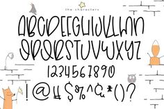 a handwritten alphabet with cats and owls on it