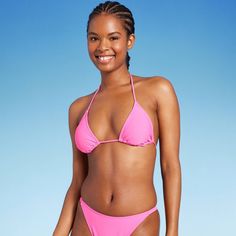 Triangle bikini top from Wild Fable™ in a solid hue. Made from soft fabric with spandex for stretchy comfort in and out of the water. Removable cups offer customizable coverage. Adjustable thin straps plus back and behind-neck ties provide the perfect stay-put fit. If you're not satisfied with any Target Owned Brand item, return it within one year with a receipt for an exchange or a refund. Wild Fable™: A look for every story. Cabo Fits, Outter Banks, Top With Shorts, Pink M, Swim Suits, Triangle Bra, Neck Ties, Swim Suit Bottoms, High Leg