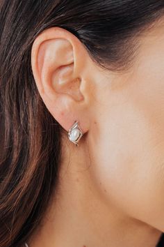 Our simple, freshwater pearl earrings are a beautiful addition to any collection. These earrings can be dressed up or dressed down for an elegant touch to any outfit.