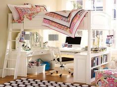 a white bunk bed sitting in a bedroom next to a desk with a computer on it