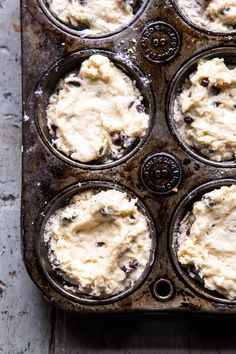 cupcakes with cream cheese in a muffin tin