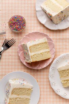 three slices of cake on plates with sprinkles next to one slice missing