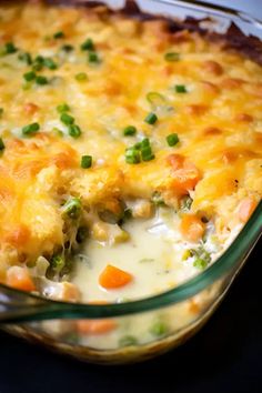 a casserole dish with cheese and vegetables in it, ready to be eaten